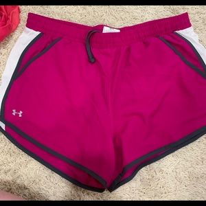 NWT; Darker Pink Under Armour running shorts Size: Large